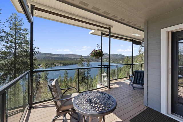 6595D Lois Way, Nine Mile Falls, WA 99026 - wooden deck with a water and mountain view