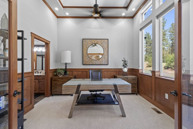 6595D Lois Way, Nine Mile Falls, WA 99026 - home office featuring french doors, a towering ceiling, plenty of natural light, light colored carpet, and a wainscoted wall