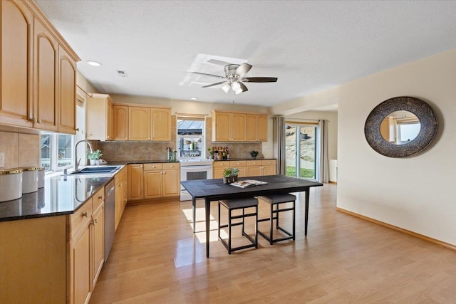 8626 E Sugar Pine Ln, Spokane, WA 99217 - kitchen featuring a sink, white electric range, light brown cabinetry, dishwasher, and decorative backsplash