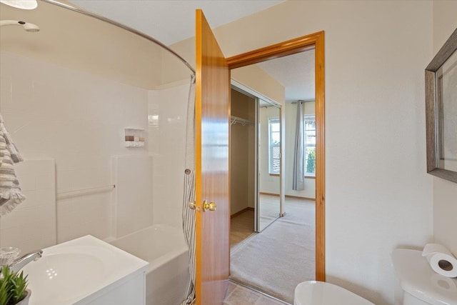 8626 E Sugar Pine Ln, Spokane, WA 99217 - bathroom featuring toilet, shower / washtub combination, and vanity
