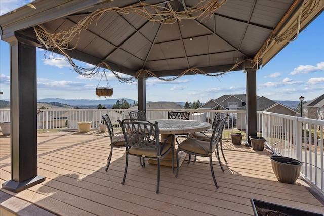8626 E Sugar Pine Ln, Spokane, WA 99217 - wooden deck with outdoor dining area and a gazebo