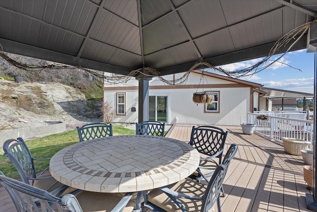 8626 E Sugar Pine Ln, Spokane, WA 99217 - wooden deck featuring outdoor dining space