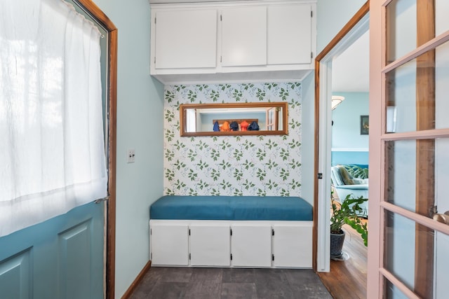 697 N Hofstetter St, Colville, WA 99114 - mudroom with wallpapered walls, dark wood-style floors, and baseboards