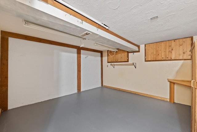 697 N Hofstetter St, Colville, WA 99114 - finished basement with a textured ceiling