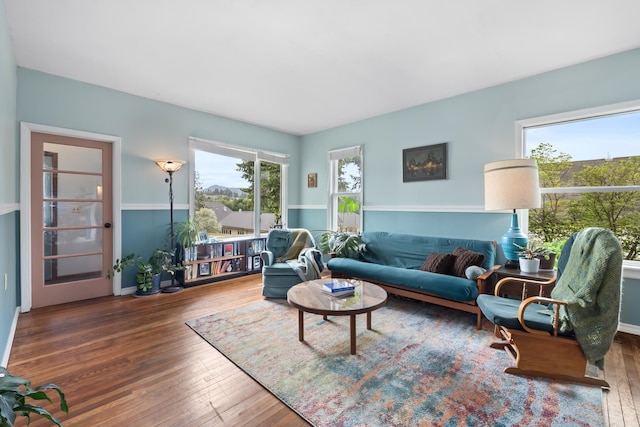 697 N Hofstetter St, Colville, WA 99114 - living room featuring hardwood / wood-style flooring and healthy amount of natural light
