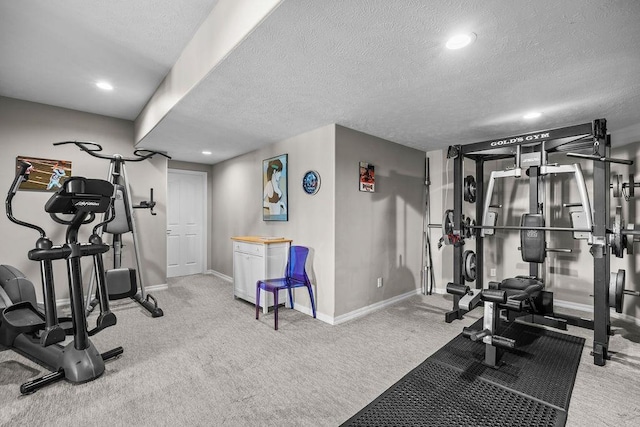 10409 E Grouse Mountain Ln, Spokane, WA 99206 - workout room with baseboards, a textured ceiling, carpet, and recessed lighting