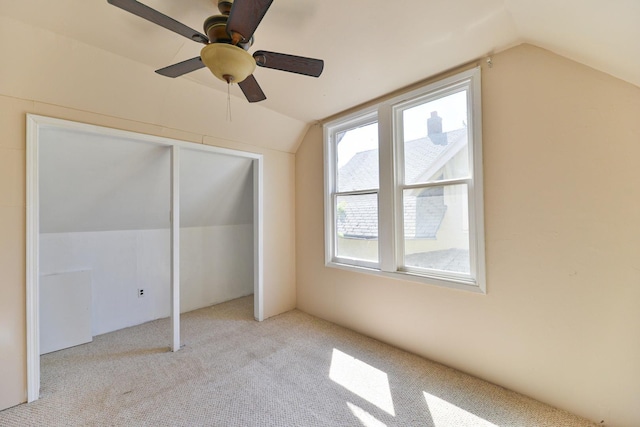 2321 W Boone Ave, Spokane, WA 99201 - unfurnished bedroom featuring vaulted ceiling, carpet floors, a ceiling fan, and a closet