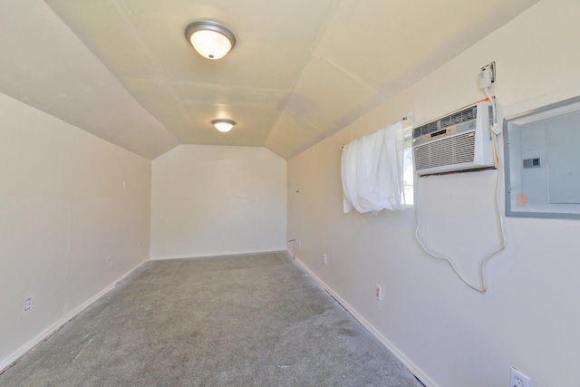 2321 W Boone Ave, Spokane, WA 99201 - bonus room featuring electric panel, carpet, vaulted ceiling, a wall unit AC, and baseboards