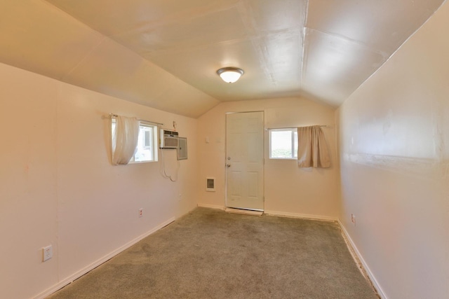 2321 W Boone Ave, Spokane, WA 99201 - bonus room featuring plenty of natural light, lofted ceiling, carpet floors, baseboards, and an AC wall unit