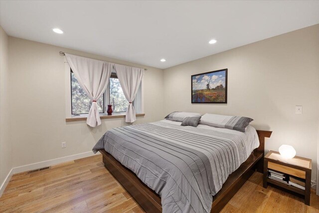 17323 N Lower Greenbluff Rd, Colbert, WA 99005 - bedroom with light wood finished floors, baseboards, and recessed lighting