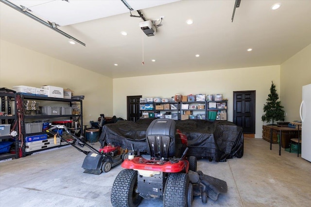 17323 N Lower Greenbluff Rd, Colbert, WA 99005 - garage with recessed lighting, freestanding refrigerator, and a garage door opener