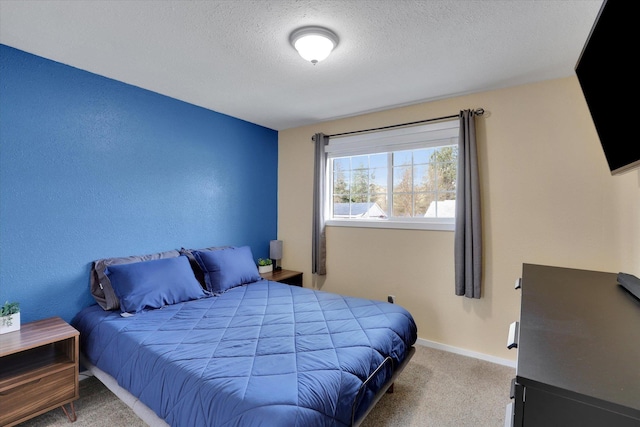 10104 E 13th Ave, Spokane Valley, WA 99206 - carpeted bedroom featuring a textured ceiling and baseboards