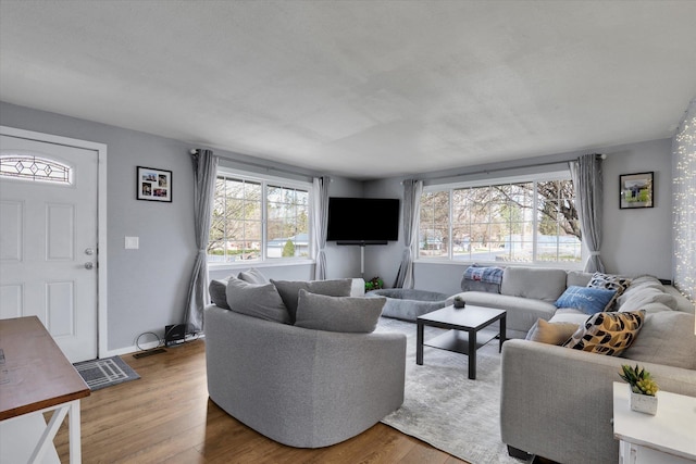 10104 E 13th Ave, Spokane Valley, WA 99206 - living room featuring healthy amount of natural light and wood finished floors