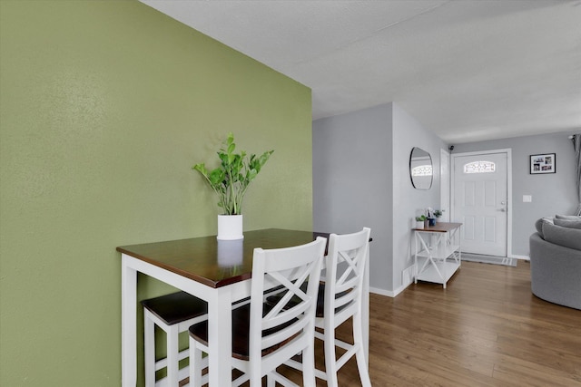 10104 E 13th Ave, Spokane Valley, WA 99206 - dining area with wood finished floors and baseboards