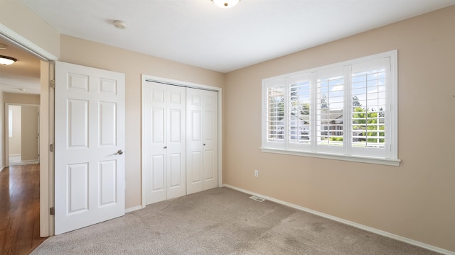 3404 W Excell Ave, Spokane, WA 99208 - unfurnished bedroom with baseboards, a closet, and carpet flooring