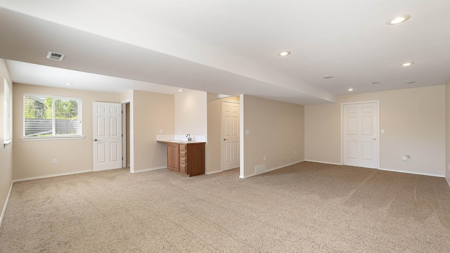 3404 W Excell Ave, Spokane, WA 99208 - unfurnished room featuring light carpet, baseboards, recessed lighting, and wet bar