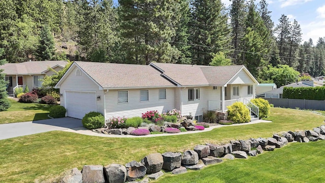 3404 W Excell Ave, Spokane, WA 99208 - ranch-style home featuring concrete driveway, a shingled roof, and an attached garage