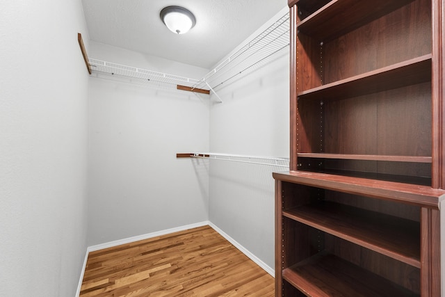5607 N Elgin St, Spokane, WA 99205 - walk in closet with wood finished floors