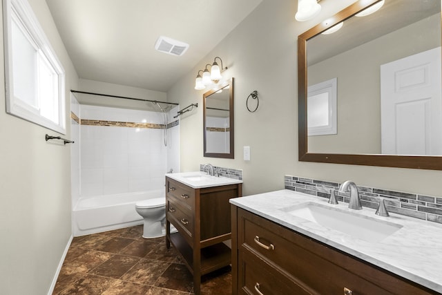 5607 N Elgin St, Spokane, WA 99205 - bathroom featuring two vanities, toilet,  shower combination, and baseboards