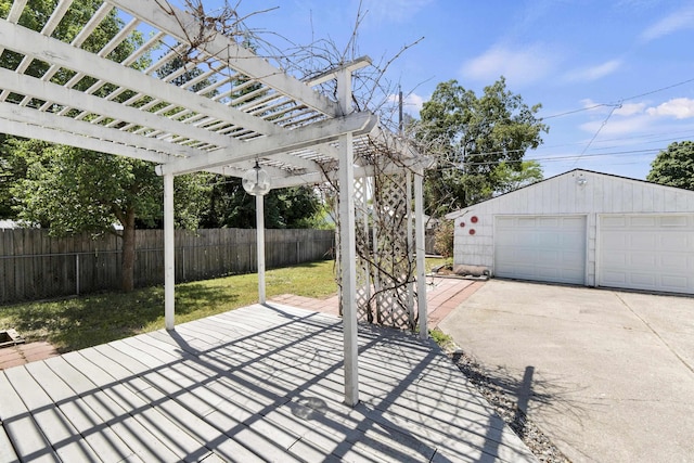 5607 N Elgin St, Spokane, WA 99205 - view of patio / terrace with a garage, a pergola, and an outbuilding