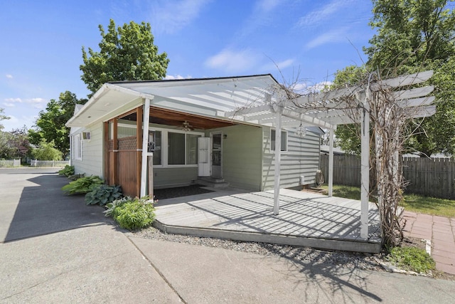 5607 N Elgin St, Spokane, WA 99205 - rear view of house featuring a ceiling fan, entry steps, and a pergola