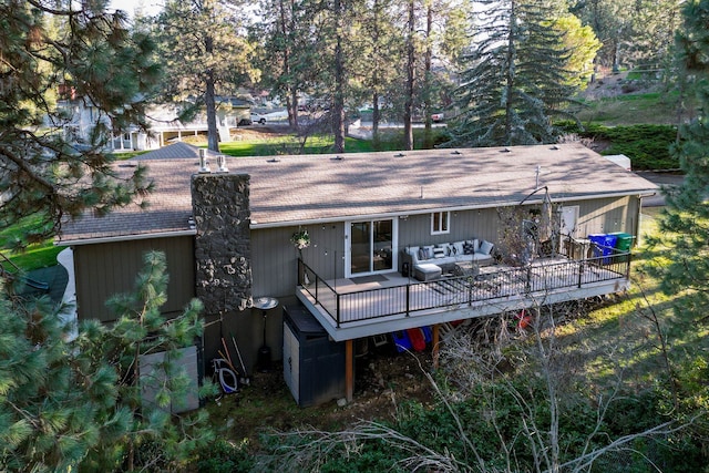 12327 E Sioux Cir, Spokane Valley, WA 99206 - back of house featuring an outdoor living space, a wooden deck, and a shingled roof