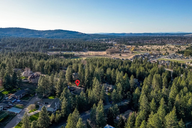 12327 E Sioux Cir, Spokane Valley, WA 99206 - aerial view of property and surrounding area featuring a heavily wooded area and a mountain backdrop