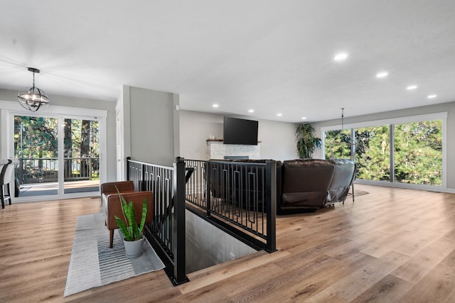 12327 E Sioux Cir, Spokane Valley, WA 99206 - living room with healthy amount of natural light, recessed lighting, wood finished floors, and a chandelier