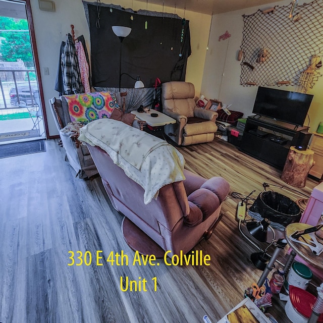 330 E 4th Ave, Colville, WA 99114 - living room featuring wood finished floors