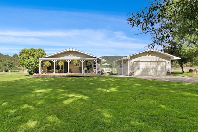 20201 E Lincoln Rd, Otis Orchards, WA 99027 - view of front facade with covered porch and a detached garage