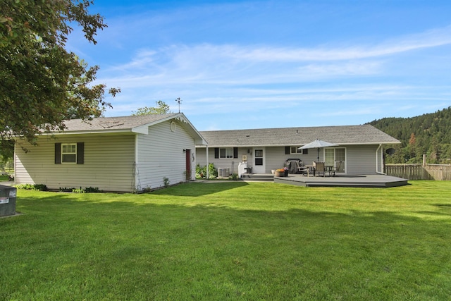 20201 E Lincoln Rd, Otis Orchards, WA 99027 - rear view of property featuring a wooden deck