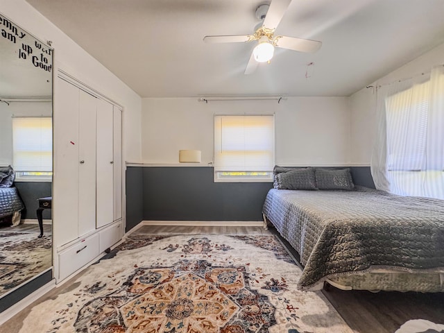 4015 N Ash St, Spokane, WA 99205 - bedroom with wood finished floors, a ceiling fan, and baseboards