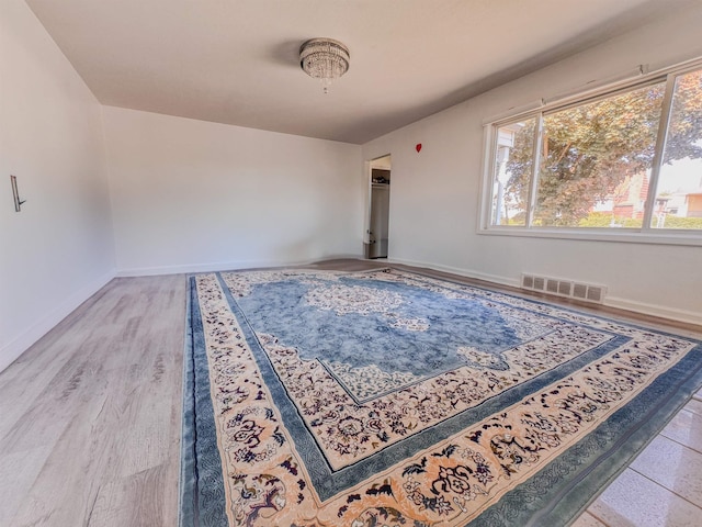 4015 N Ash St, Spokane, WA 99205 - unfurnished room featuring baseboards and wood finished floors