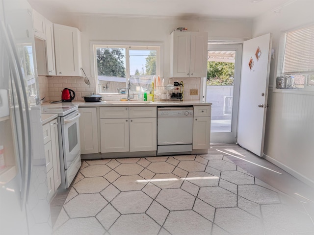 4015 N Ash St, Spokane, WA 99205 - kitchen featuring white appliances, a sink, light countertops, backsplash, and white cabinets