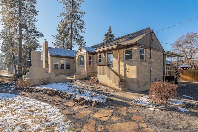 2828 S Arthur St, Spokane, WA 99203 - view of front of home featuring a chimney and brick siding