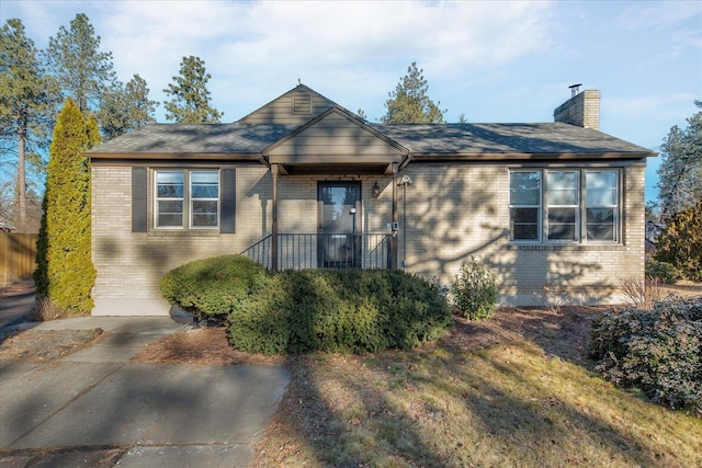 2828 S Arthur St, Spokane, WA 99203 - ranch-style house featuring a chimney and brick siding