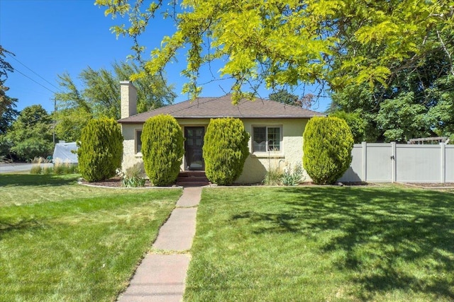 10503 E Valleyway Ave, Spokane Valley, WA 99206 - view of front of property with a chimney, stucco siding, and a gate