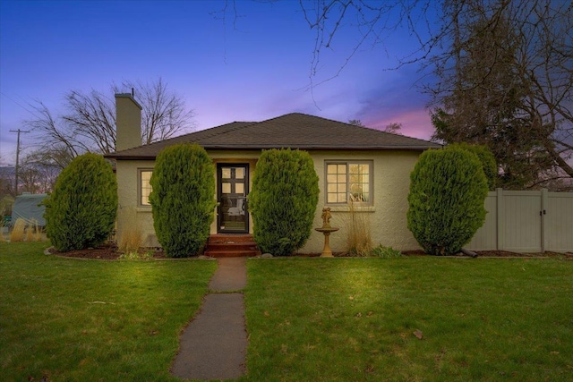 10503 E Valleyway Ave, Spokane Valley, WA 99206 - view of front facade featuring stucco siding and a chimney