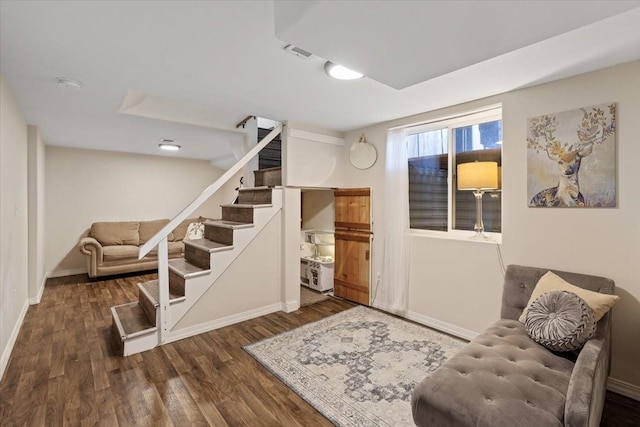 10503 E Valleyway Ave, Spokane Valley, WA 99206 - below grade area with wood finished floors, stairs, and baseboards