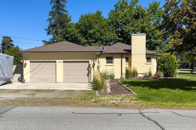 10503 E Valleyway Ave, Spokane Valley, WA 99206 - ranch-style home featuring a chimney, stucco siding, a garage, a front yard, and driveway