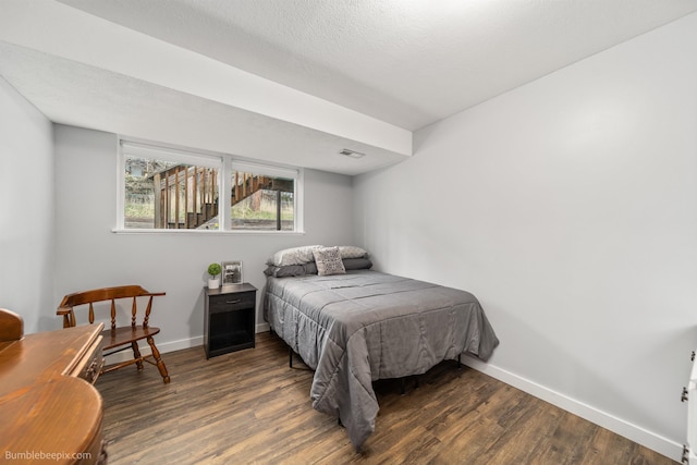 4116 W Indian Trail Rd, Spokane, WA 99208 - bedroom featuring wood finished floors and baseboards