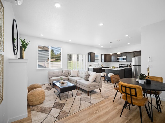 805 E F St, Deer Park, WA 99006 - living room with light wood-style flooring, recessed lighting, and baseboards