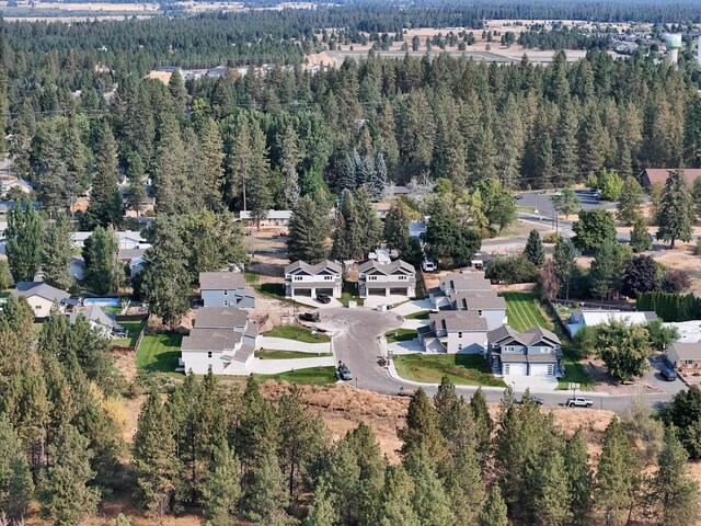 805 E F St, Deer Park, WA 99006 - aerial view of property's location with a heavily wooded area and nearby suburban area