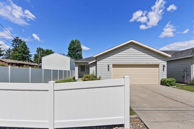 11103 E Main Ave, Spokane Valley, WA 99206 - ranch-style home with driveway and a garage