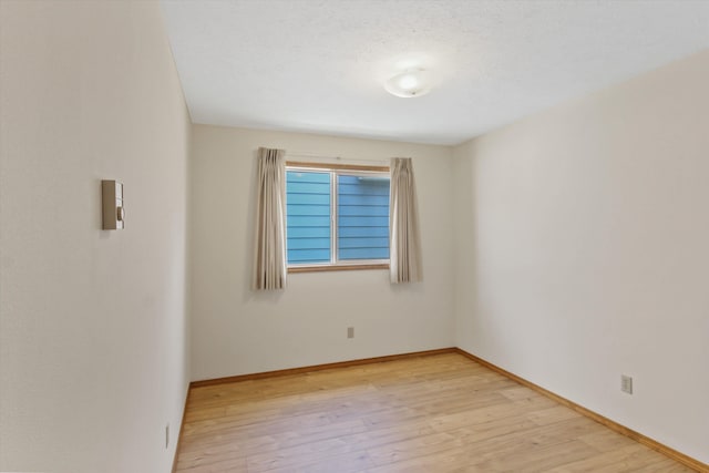 11103 E Main Ave, Spokane Valley, WA 99206 - unfurnished room with light wood finished floors and baseboards