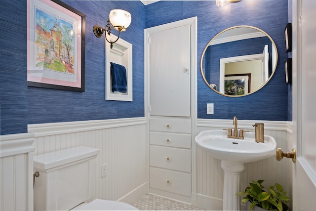 704 E 20th Ave, Spokane, WA 99203 - bathroom with wallpapered walls, a wainscoted wall, toilet, and tile patterned flooring