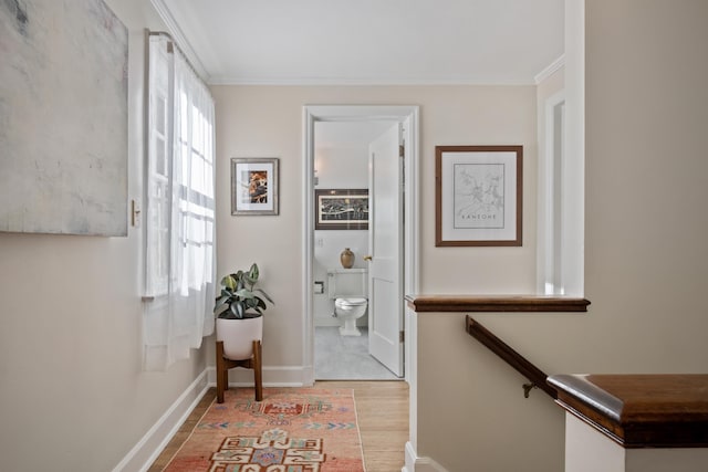 704 E 20th Ave, Spokane, WA 99203 - hall featuring ornamental molding, light wood finished floors, and baseboards