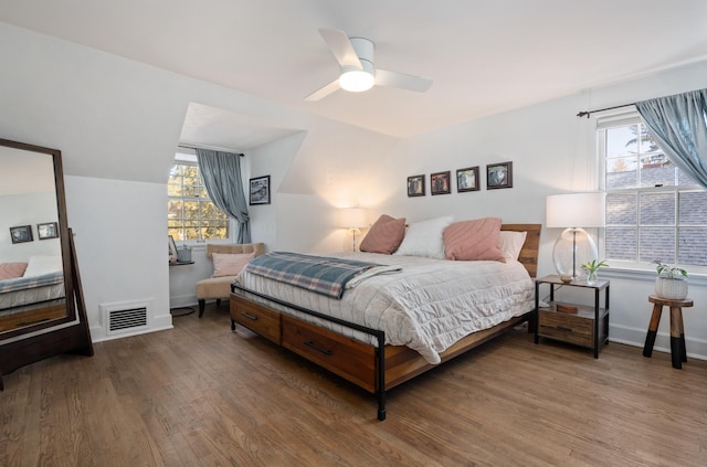 704 E 20th Ave, Spokane, WA 99203 - bedroom with wood finished floors, lofted ceiling, baseboards, and a ceiling fan