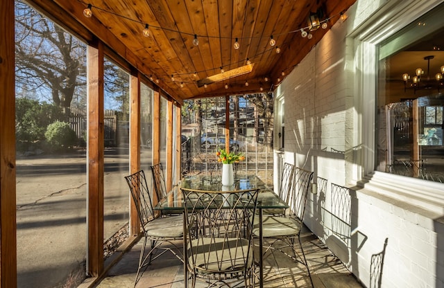 704 E 20th Ave, Spokane, WA 99203 - unfurnished sunroom featuring a chandelier