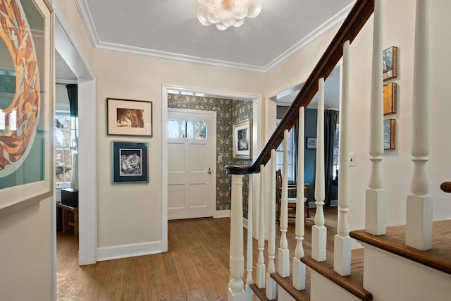704 E 20th Ave, Spokane, WA 99203 - foyer entrance featuring stairs, wood finished floors, plenty of natural light, crown molding, and baseboards